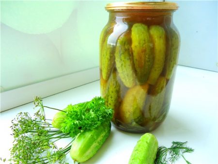 Winter cucumbers with chili ketchup in liter jars