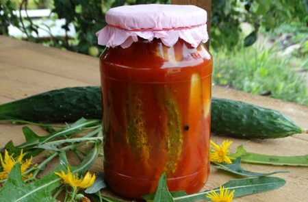 Jar of cucumbers in tomato