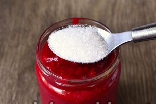 pour sugar on top in a jar
