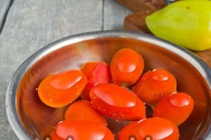 pour tomatoes with boiling water