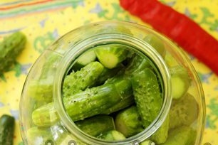 fill the jar with cucumbers