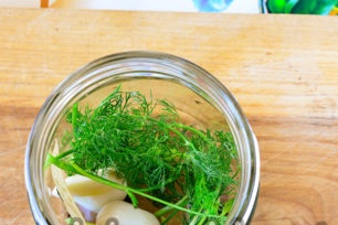 greens, garlic, spices in a jar